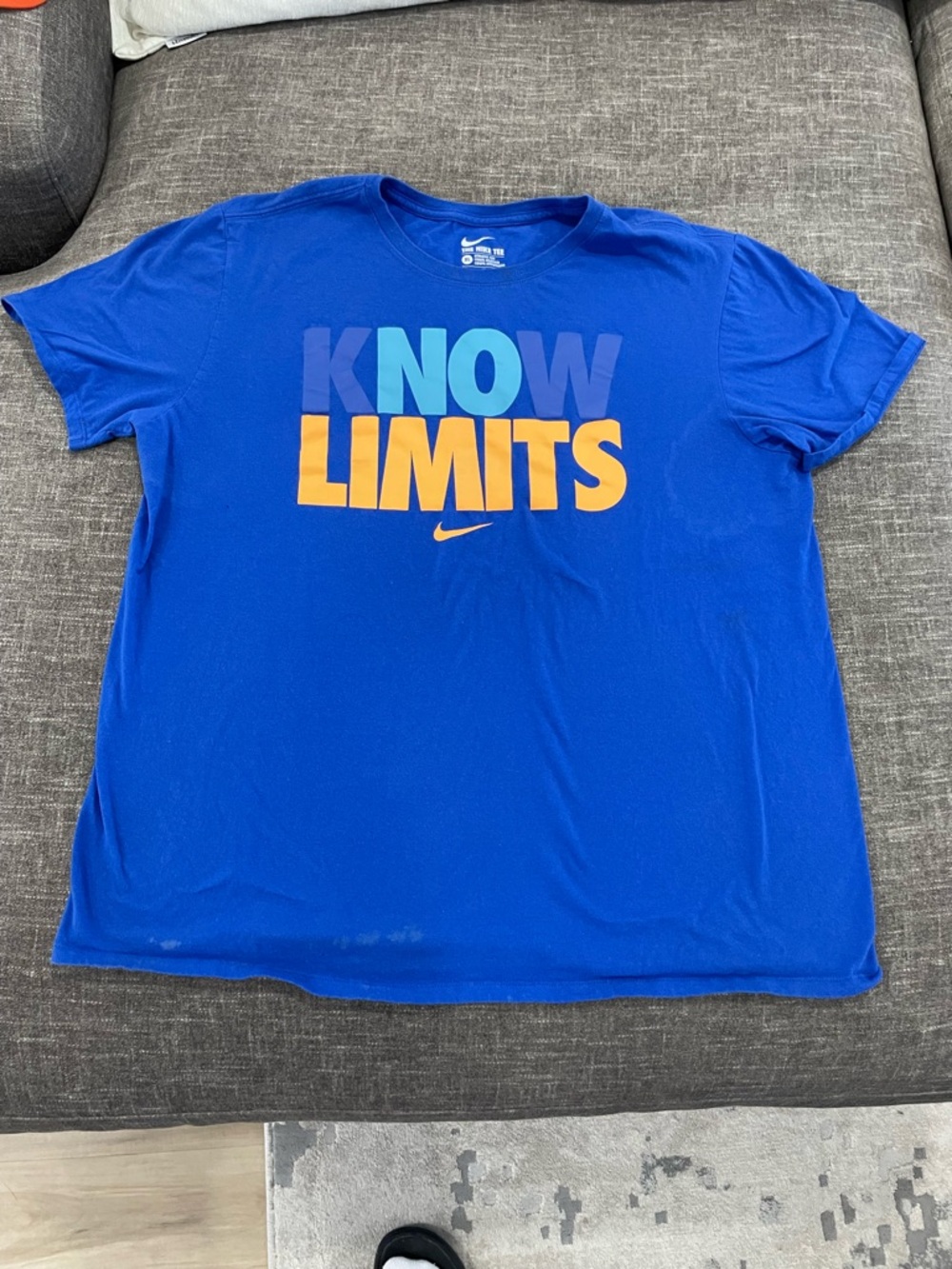 Nike Blue 'Know Limits' Graphic Tee with Yellow Accent